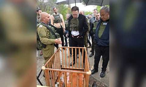 Elon Musk visit the Kfar Aza in Israel (Photo: IANS)