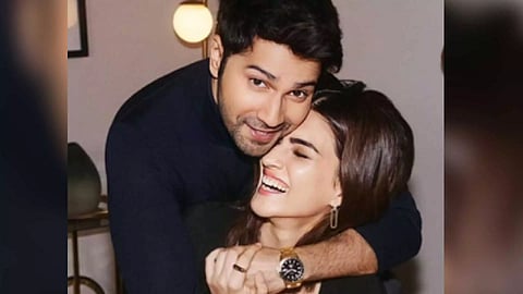 Actor Varun Dhawan gives a tight hug to Kriti Sanon (Photo/Instagram)