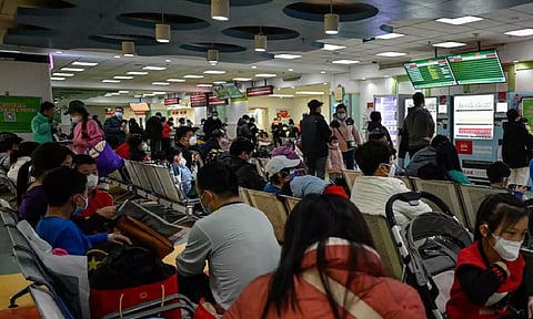 Pandemic shadows Is China muddling its response to flu spike?