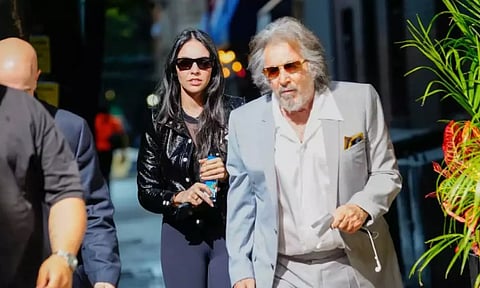 Hollywood star Al Pacino with his girlfriend. (IANS)