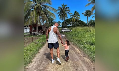 Dwayne Johnson with his daughter
