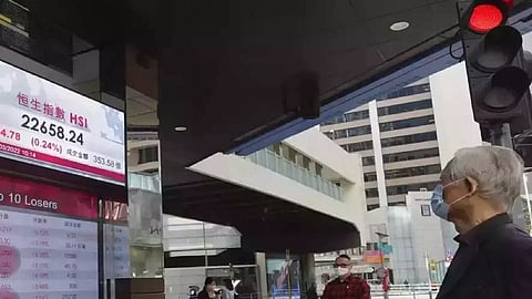 Asia shares turn mixed, gold tops $2,100 an ounce