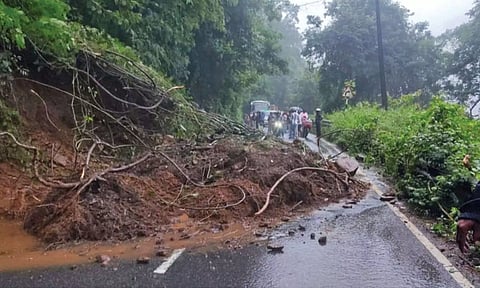 Workers clearing a mud slip on the ghat road in The Nilgiris on Sunday 