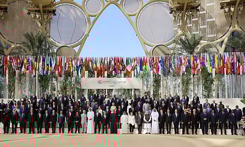 World leaders pose for a group photo during the United Nations Climate Change Conference (COP28), in Dubai, UAE, December 1, 2023. (Reuters)