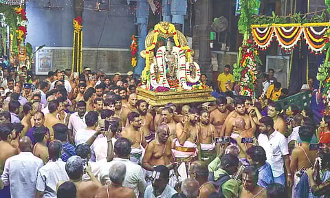 Devotees at Parthasarathy Perumal Temple in Triplicane on Vaikunta Ekadasi day, on Saturday.