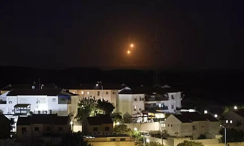 A flare falls over Gaza, amid the ongoing conflict between Israel and the Palestinian Islamist group Hamas, as seen from southern Israel. (Reuters)