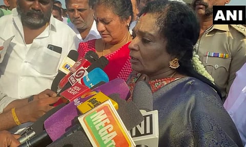 Telangana Governor Tamilisai Soundararajan speaking to reporters in Thoothukudi. (ANI)