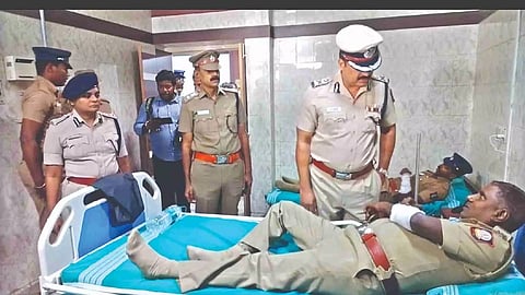 North Zone IG N Kannan and Kancheepuram range DIG R Ponni visit the injured policemen at Kancheepuram Government Hospital on Wednesday