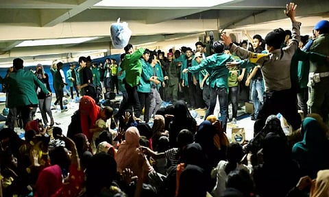 Visual of Indonesian students protesting against Rohingya refuges (Reuters)