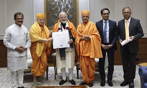 PM Modi with BAPS Swami Ishwarcharandas (ANI)