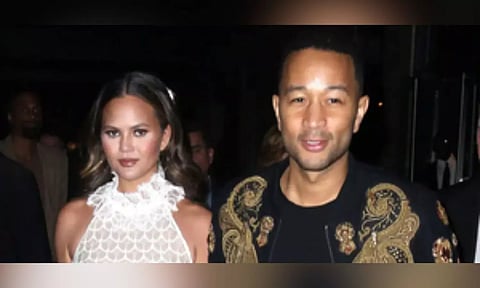 Chrissy Teigen steps out for date night with husband John Legend on his birthday
