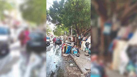 Pedestrians have to brave pavement encroachments and sewer-overflowing roads