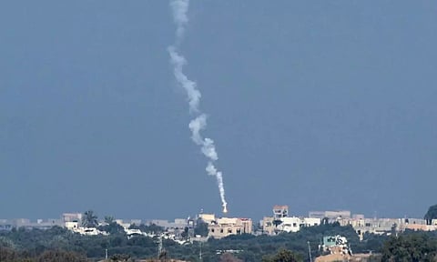 A flare falls over Gaza, amid the ongoing conflict between Israel and the Palestinian Islamist group Hamas, as seen from southern Israel (Reuters)