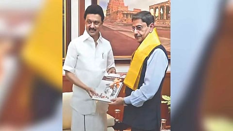 Chief Minister MK Stalin handing over a book to Governor RN Ravi at Raj Bhavan