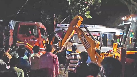 The truck being lifted with the help of a crane