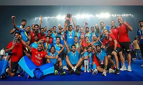 Indian team posing with the Asian Champions Trophy. (Photo- HI Media)