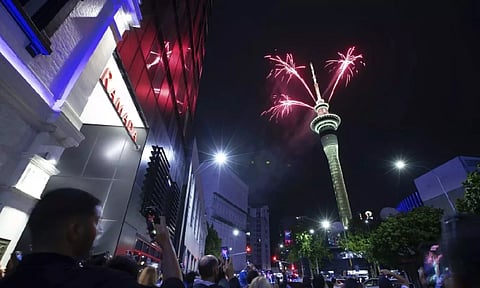 Fireworks burst from the Sky Tower in Auckland, New Zealand, to celebrate the New Year on Monday, Jan. 1, 2024.