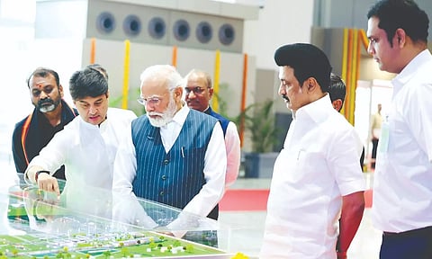 Union Aviation Minister Jyotiraditya Scindia explaining the facilities at the new terminal at Tiruchy airport to PM Modi in Tiruchy on Tuesday