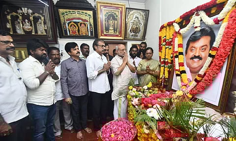 Governor of Jharkhand, CP Radhakrishnan paid floral tributes to the late actor-turned-politician Captain Vijayakanth's portrait (X: @CPRGuv)
