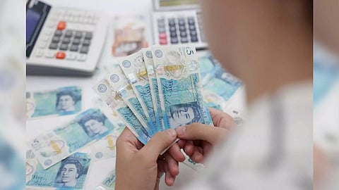 Sterling slips but remains close to 5-month high