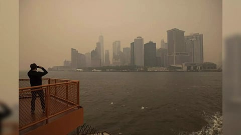 New York City is visible in a haze-filled sky due to wildfires in Canada (Photo: AP)