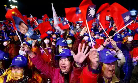 Supporters of Hou Yu-ih, a candidate for Taiwan's presidency from the main opposition party Kuomintang (KMT) attend a campaign event in Keelung (Reuters)