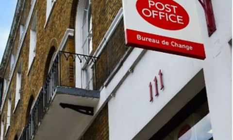 Wrongly-accused UK post office managers to be exonerated under new law: PM