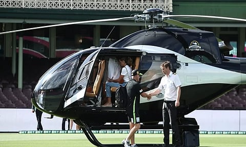 David Warner (left) arrived in a helicopter. (Photo: BBL)