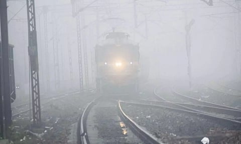 Blurred vision of trains due to dense fog. (ANI)
