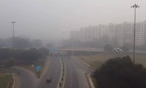 Visuals from AIIMS area as fog grips the national capital. (ANI)