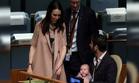 Former New Zealand PM Jacinda Ardern with partner Clarke Gayford and daughter Neve (Reuters)