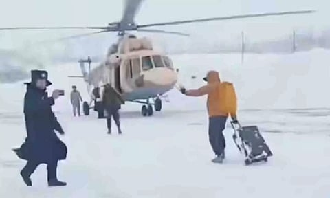 Tourists being airlifted to safety by helicopter (Reuters) 