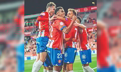 Girona players celebrate their victory over Rayo Vallecano