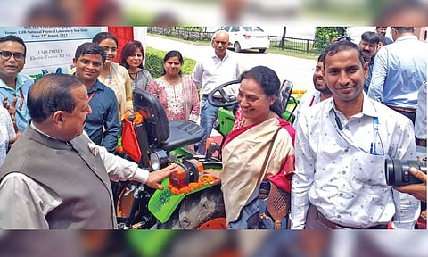 Minister Jitendra Singh inspecting electric tractor developed by CSIR