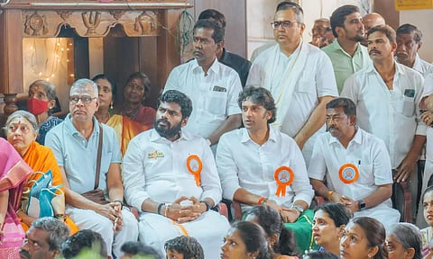 BJP state president K Annamalai watching the live telecast of Pran Pratishtha at Ayodhya from Shri Venugopalaswamy Temple in Gopalapuram in Chennai on Monday