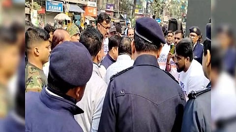 An image purportedly showing the police stopping the screening of PM Modi's virtual interaction with first-time voters in Bengal. (Photo/ANI)