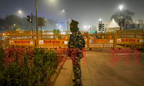 A security official stands guard on the eve of Republic Day, in New Delhi. (PTI)
