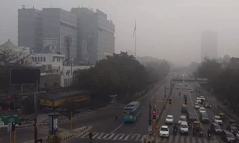 Visuals of a thin layer of fog gripping the national capital. (ANI)