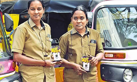 Two auto drivers show Namma Yatri app card in city on Monday