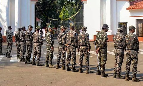 Security personnel outside the Jharkhand Raj Bhavan regarding the law and order situation after ED seized cash and an SUV from Jharkhand CM Hemant Soren's Delhi house in Ranchi. (PTI)