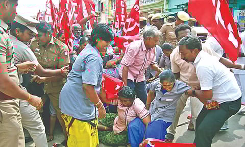 The terminated cleanliness staff staged a protest in front of the Ranga Ranga Gopuram on Thursday