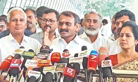 BJP leader L Murugan talking to reporters in Coimbatore