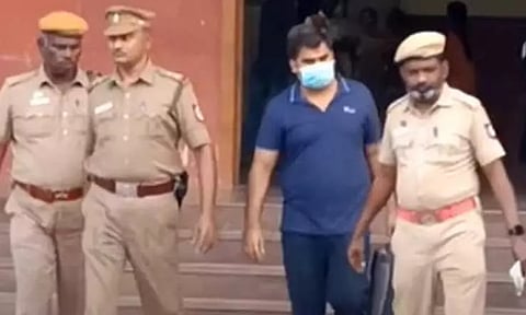 Ankit Tiwari being produced in court for the hearing on his second bail petition on Tuesday. (PTI)