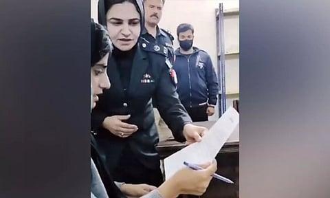 Viral video of Pakistan police forcing relatives victims of enforced disappearances (ANI)