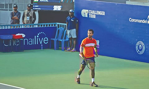 Sumit Nagal reacts after winning a point against Prajwal Dev in his first round match on Tuesday