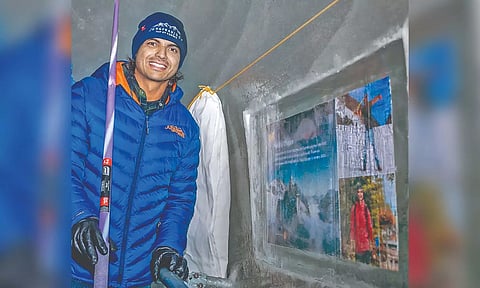 Neeraj Chopra poses with the plaque at Jungfraujoch