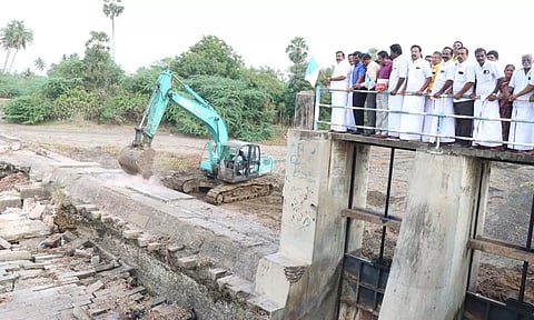 Minister KN Nehru launched the project for replacing the sluice gate at Mela Panguni canal in Lalgudi on Friday.