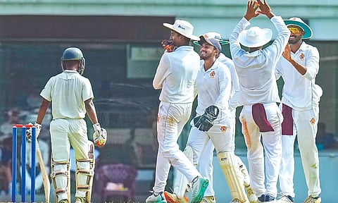 Karnataka celebrates the wicket of Tamil Nadu’s S Lokeshwar on the second day of the Ranji Trophy