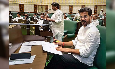 Telangana CM A Revanth Reddy looks on as State Dy CM and FM Bhatti Vikramarka during the Budget session of State Assembly in Hyderabad on Saturday, (PTI)