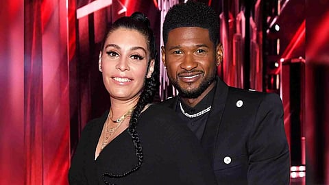 Singer Usher; Jennifer Goicoechea